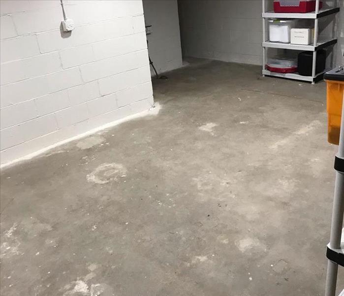 unfinished basement that has been cleaned and sanitized after sewage backup